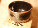 Guinomi (sake cup) with temmoku-style persimmon glaze by Minowa Yasuo